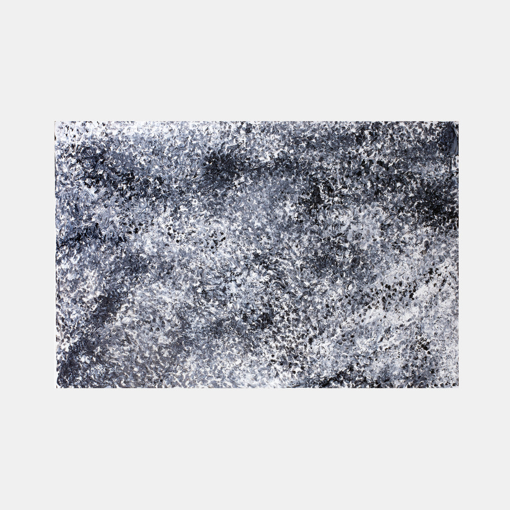 The artwork 'Hollywood Hills' by Camilla Webster features an abstract expressionist landscape in monochromatic tones. Dynamic brushstrokes create a textural composition of black, white, and silvery gray hues, suggesting a misty aerial view. The 48x72 inch acrylic on canvas captures a moody, atmospheric perspective with speckled effects and layered paint techniques by Camilla Webster.