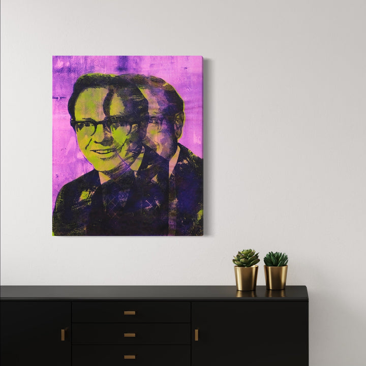 The artwork 'Capitalism Is The Way' features a pop art-style portrait with a triple exposure effect against a vibrant magenta background. The silkscreen print combines yellow and deep purple tones, creating a striking contrast. The composition showcases a head and shoulders view rendered in a bold, Warhol-inspired technique using hand-pulled silkscreen, ink, spray paint and acrylic on canvas. By Rudy Meyer.