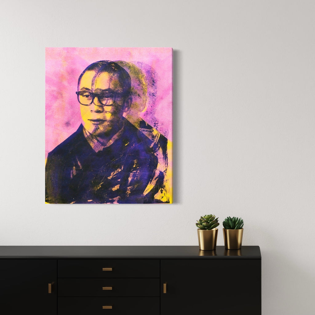 The artwork 'Happiness Is The Way [The Dalai Lama]' by Rudy Meyer features a portrait silkscreened against a vibrant pink background. The composition uses bold spray paint techniques and acrylic details, creating a pop art style with contrasting purple and yellow tones. The canvas artwork showcases expressive brushstrokes and urban art elements, combining traditional and contemporary methods. By Rudy Meyer.