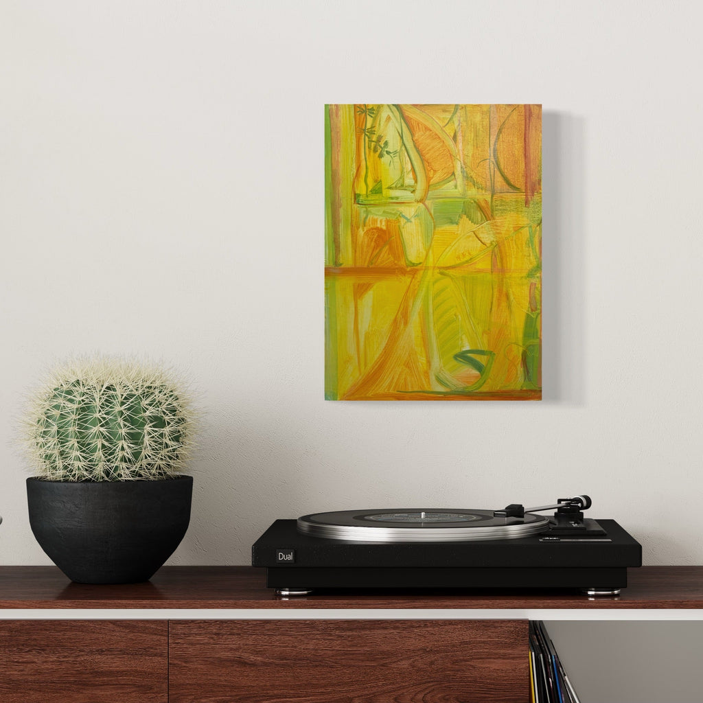 The artwork 'Jennifer's Porch' by Taiss Ghuliani features vibrant abstract composition in yellow and green hues, with fluid geometric shapes and organic lines. The oil painting displays dynamic brushstrokes creating a warm, sunlit atmosphere through layered translucent forms. Displayed alongside a potted cactus and turntable on wooden shelf. Oil on canvas, 15x11 inches. By Taiss Ghuliani.