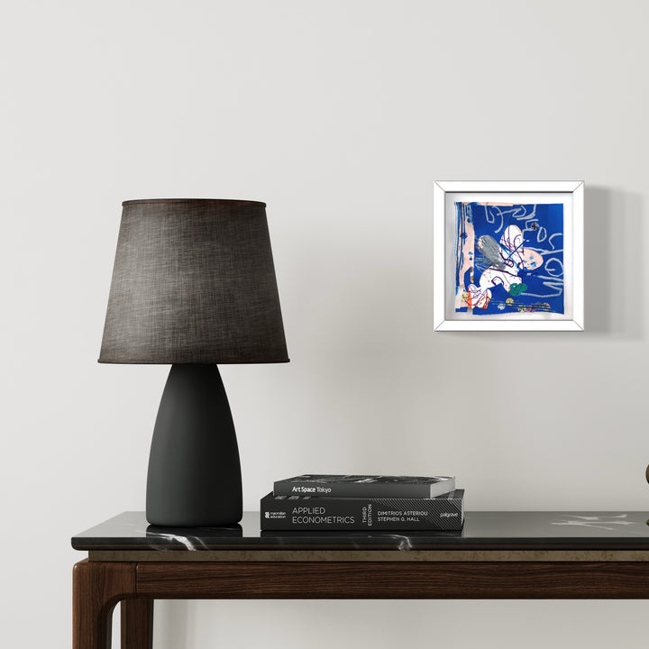 The artwork 'Origami Garden no.10' by Songyi Kim features delicate paper collage elements in vibrant royal blue and white, arranged in an abstract floral pattern. Set in a white frame, the 6x6 inch mixed media piece incorporates traditional Washi tape and layered textures, creating a contemporary interpretation of Japanese paper art themes by Songyi Kim.