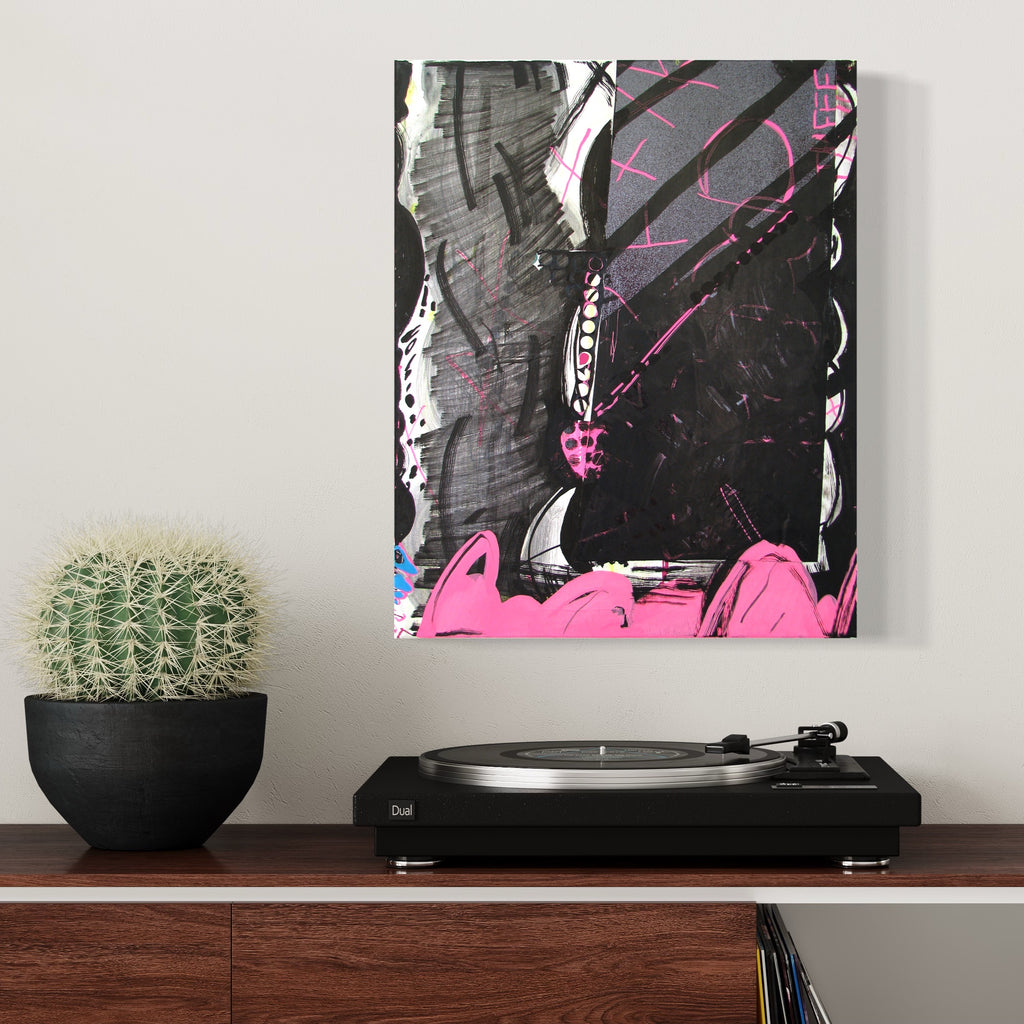 The artwork 'Music Painting no.4' by Songyi Kim features bold abstract expressionism with dynamic black brushstrokes contrasting against vibrant pink elements. Striking silver foil accents create metallic highlights throughout the composition, while gestural marks and paint marker details add rhythmic movement across the 20x16 inch canvas. A monochromatic dark background anchors the energetic composition.
