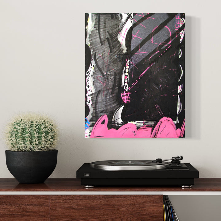 The artwork 'Music Painting no.4' by Songyi Kim features bold abstract expressionism with dynamic black brushstrokes contrasting against vibrant pink elements. Striking silver foil accents create metallic highlights throughout the composition, while gestural marks and paint marker details add rhythmic movement across the 20x16 inch canvas. A monochromatic dark background anchors the energetic composition.