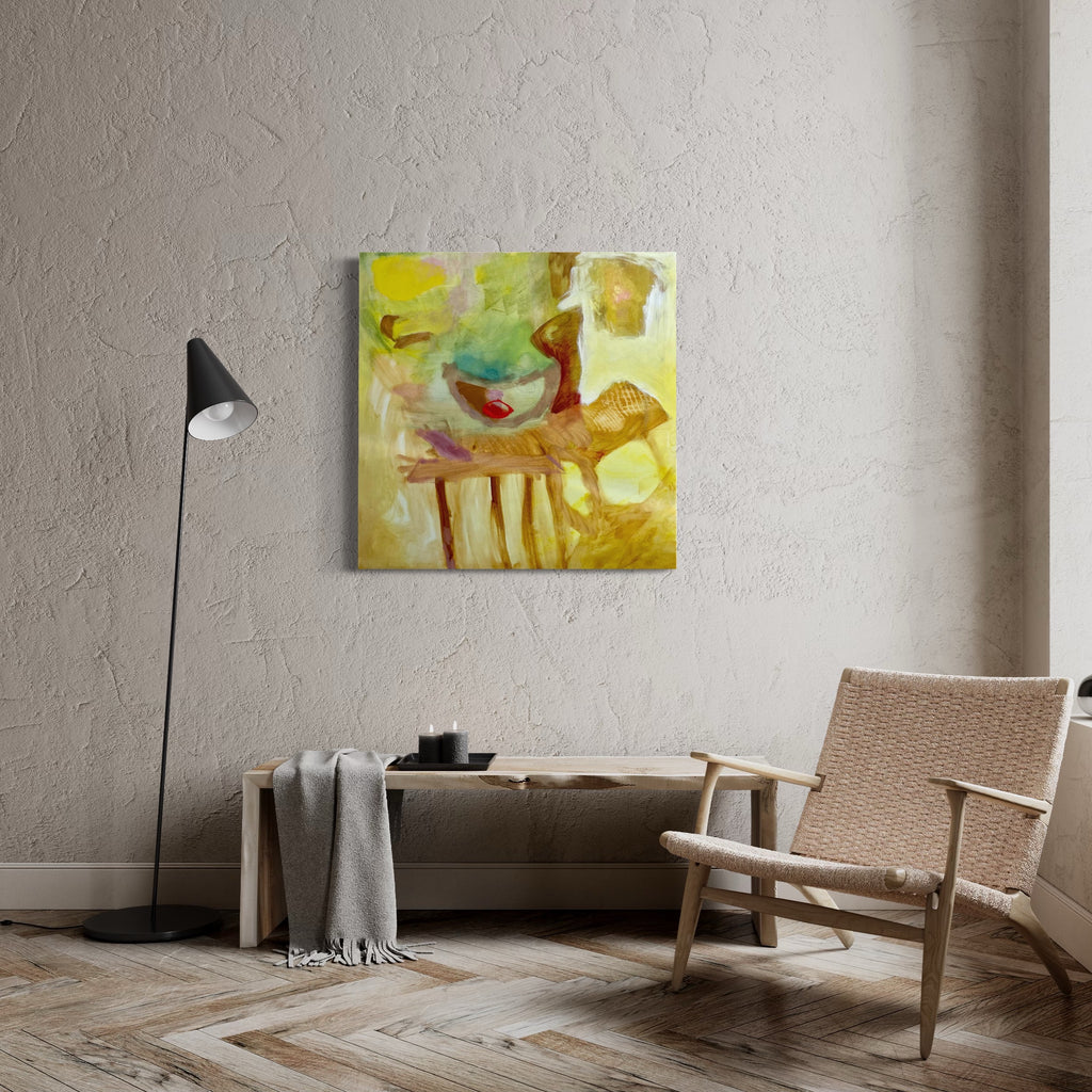 The artwork 'Spots Here and There That Shine' by Lauren Orscheln features abstract expressionist composition with vibrant yellow and green hues, complemented by earthy browns. The oil and pastel on canvas creates dynamic textures and fluid forms, with scattered spots and gestural brushstrokes floating across a luminous golden background. A central organic shape in red adds focal interest to this 36x36 inch canvas.