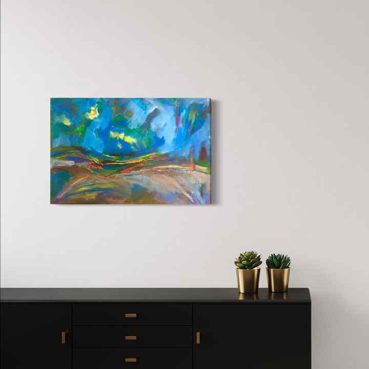 The artwork 'Fun House' by Beth Barry features a vibrant abstract landscape with sweeping brushstrokes of turquoise blue skies and earthy brown terrain. Dynamic acrylic paint application creates movement across the 24x36 inch canvas, with touches of yellow highlights and rich green undertones merging in an expressionistic style, suggesting a whimsical and energetic natural scene.
