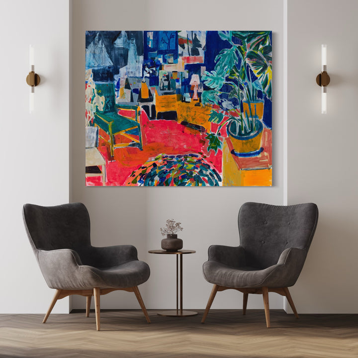 The artwork 'Riptide' by Allison Gildersleeve features a vibrant interior scene with bold geometric shapes and dynamic color blocks. A striking red floor anchors the composition, complemented by deep blues, emerald greens, and warm yellows. Abstract furniture forms and lush plant elements create a layered, energetic space. The expressive brushwork and mixed media technique combine oil and acrylic on canvas, creating rich textural depth.