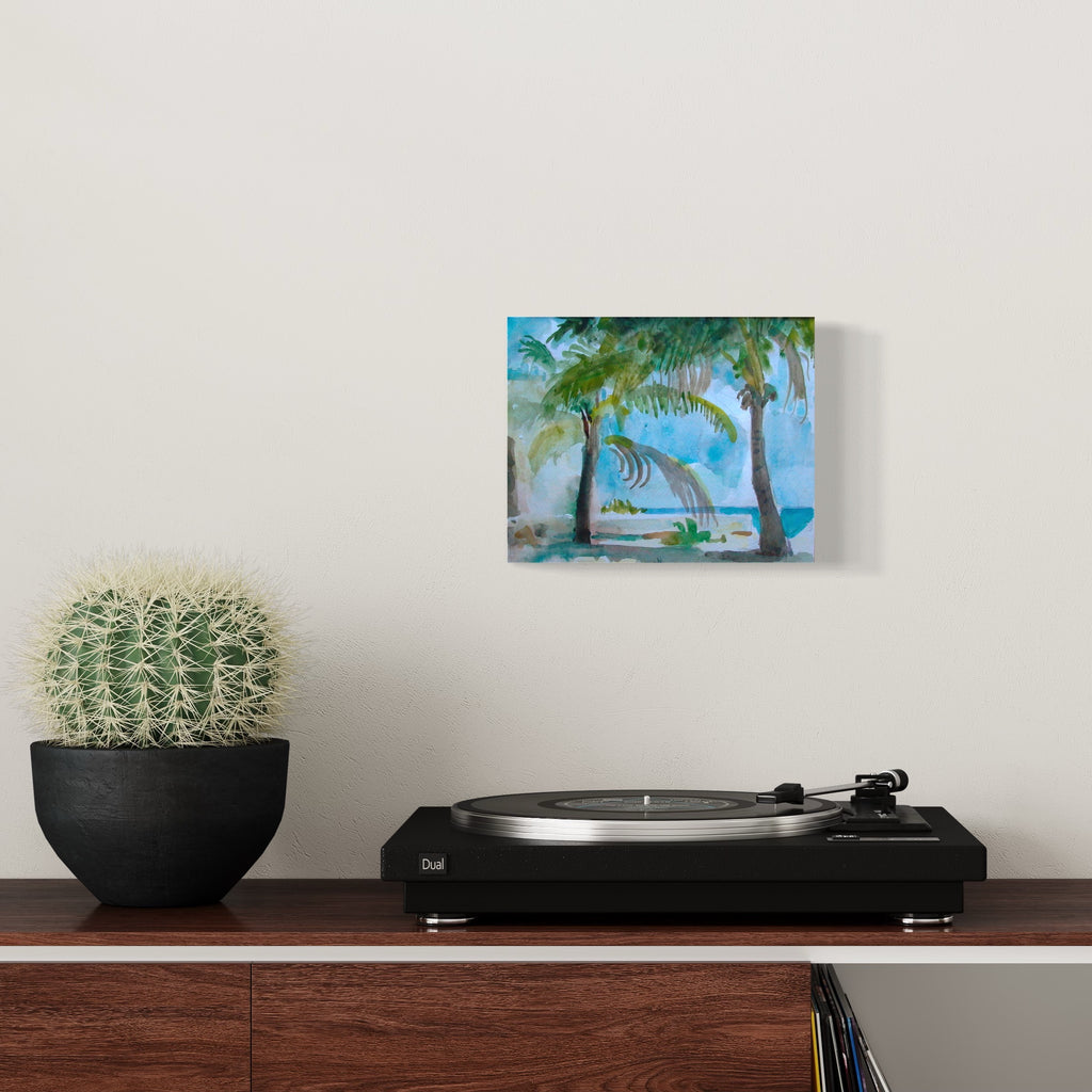 The artwork 'Playa del Carmen' by Peter Colquhoun captures a tranquil tropical beach scene in delicate watercolors, featuring swaying palm trees with feathery fronds against a vibrant turquoise ocean. The gentle brushstrokes create a serene coastal atmosphere, with soft blue skies and sandy shores rendered in loose, fluid watercolor technique, sized 8x10 inches.