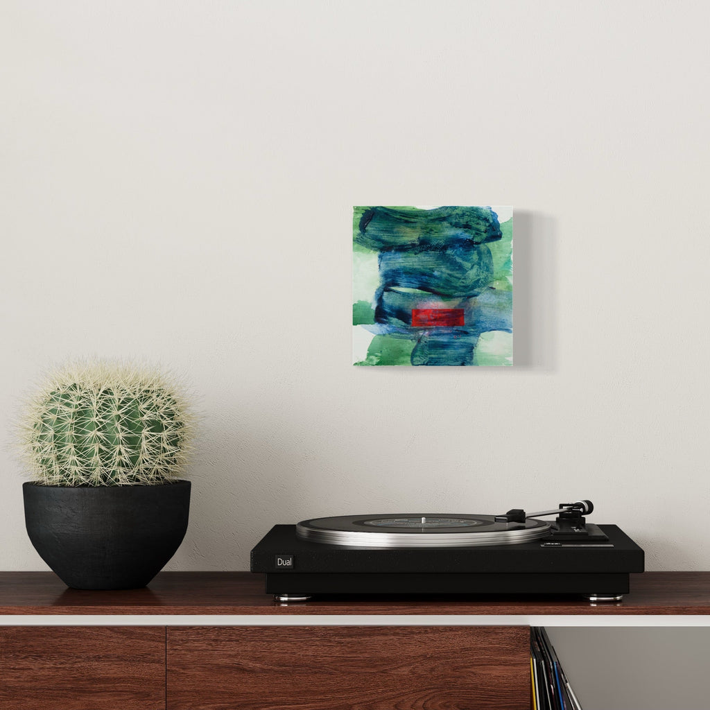 The artwork 'Small Debris Wave' by Lisa Petker Mintz features bold brushstrokes of deep turquoise and teal blues layered vertically across a pale background. A striking horizontal red rectangle punctuates the center, creating dynamic contrast. The acrylic paint application shows textural elements and fluid movement reminiscent of ocean waves or atmospheric turbulence. By Lisa Petker Mintz.