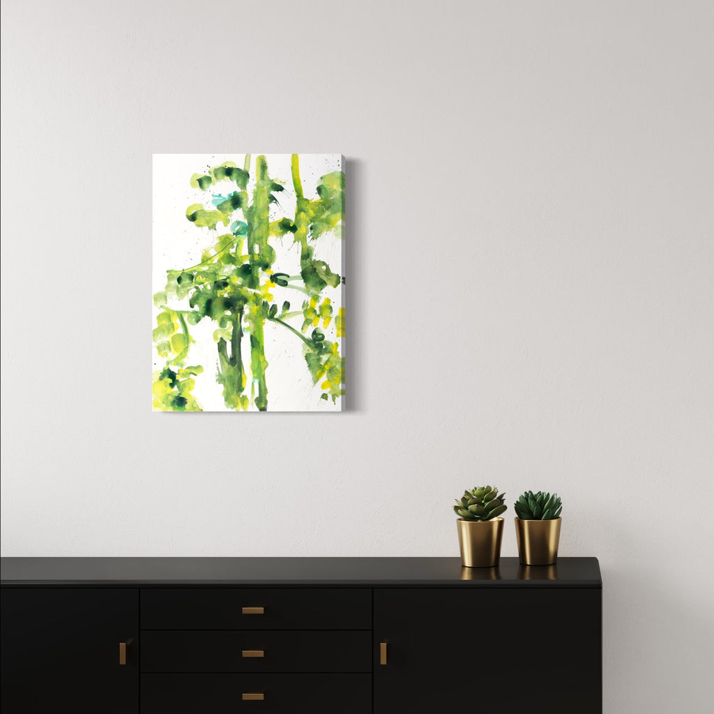 The artwork 'Tangled Vine Green' by Lisa Petker Mintz features delicate watercolor-style brushstrokes depicting abstract bamboo-like stems in vibrant spring greens. The vertical composition shows translucent botanical forms against a crisp white background, creating an airy, organic feel. The acrylic on paper technique captures the fluid, spontaneous nature of growing vines.