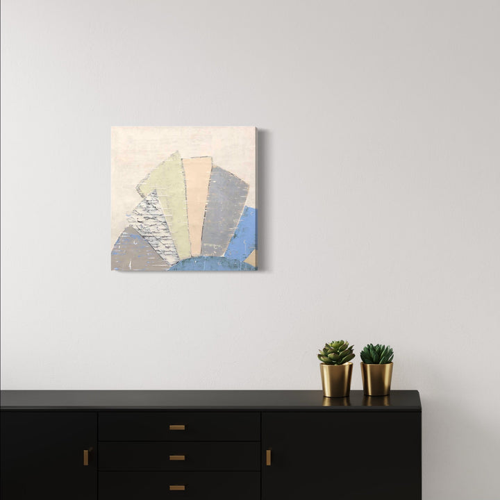 The artwork 'Hand Fan' by Shira Toren features a modern geometric composition in a fan-like pattern, rendered in soft pastel colors including pale blue, mint green, and peach tones on a textured canvas. Created with Venetian Plaster and pigments, the 24x24 inch piece showcases a delicate interplay of light and texture, with triangular segments radiating outward in a minimalist style.