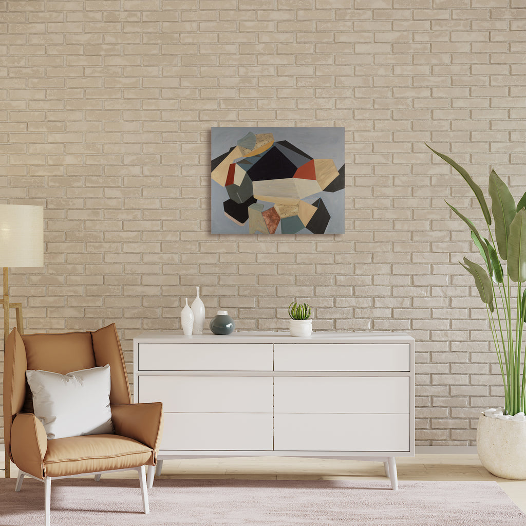 The artwork 'Instructions Not Included' by Karen Nielsen-Fried features an abstract geometric composition with bold angular shapes in black, beige, and gray tones on a wood panel. The acrylic painting showcases dynamic intersecting forms creating a modern, minimalist design with subtle texture and depth. The 24x30 inch piece displays a harmonious balance of sharp edges and organic movement.