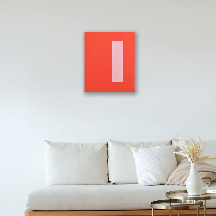 The artwork 'Integrity' by Shyun Song features a striking minimalist composition with a bold coral-red rectangular canvas displaying a single vertical pale pink stripe. The geometric abstract painting creates a powerful contrast against a white wall, embodying modern contemporary style in oil on canvas, 24x20 inches. By Shyun Song.