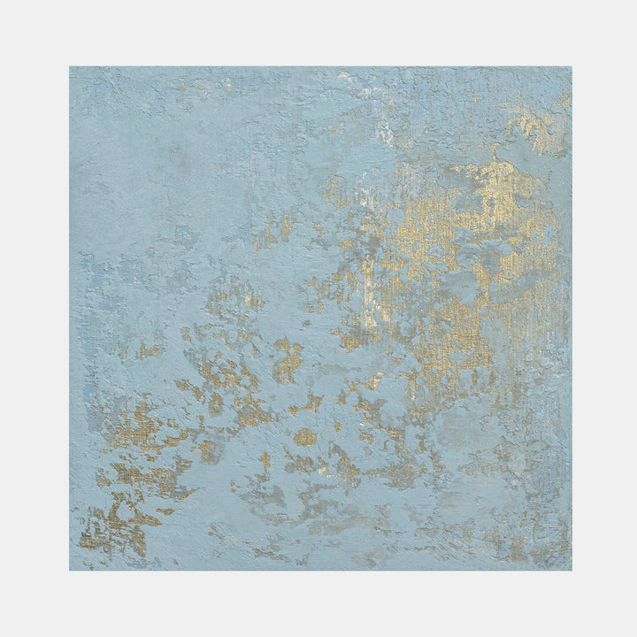 The artwork 'Interference I' features a textured abstract composition on birch panel, combining soft powder blue background with scattered iridescent gold accents creating a weathered, ethereal effect. The acrylic medium creates depth through varied surface treatments, suggesting atmospheric distortion and natural patina. By Curina.