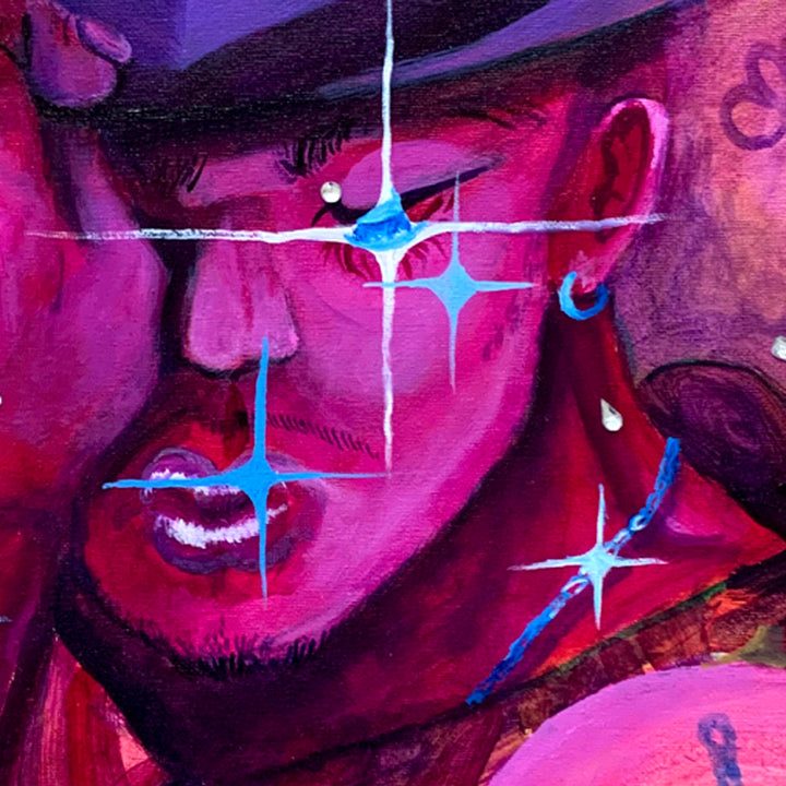 The artwork 'Caballero' by Juan Arango Palacios features a vibrant close-up portrait in magenta and purple tones, adorned with striking electric blue star-like highlights and sparkling rhinestone accents. The acrylic painting showcases bold brushwork with dynamic contrasts, creating a modern pop art aesthetic against a dark background.
