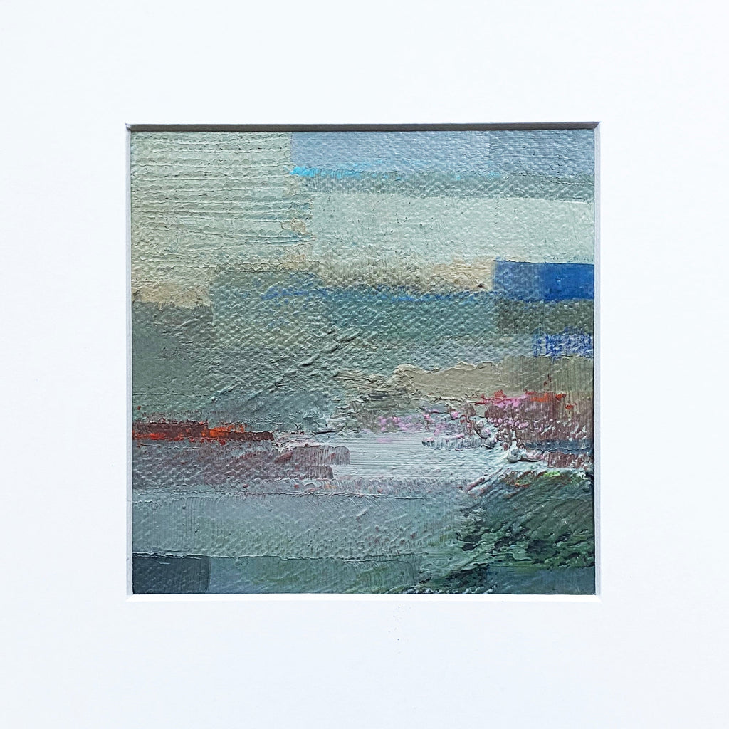 The artwork 'MOMENTUM VI' by Xanthippe Tsalimi features an abstract landscape rendered in textured oil paint, with layered brushstrokes of seafoam green, misty blue, and subtle burgundy tones. The composition suggests a coastal horizon where sky meets water, with dynamic textural elements creating depth and movement across the 8x8 inch canvas.