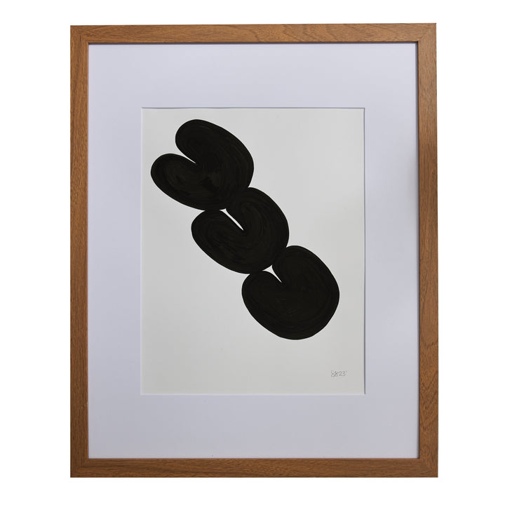The artwork 'Morning Meditation IV' by Shadia Sabagh features bold black organic shapes on white paper, displaying three interconnected abstract circular forms arranged diagonally. The minimalist composition is presented in a wooden frame with white matting, created using acrylic marker on mixed media paper.