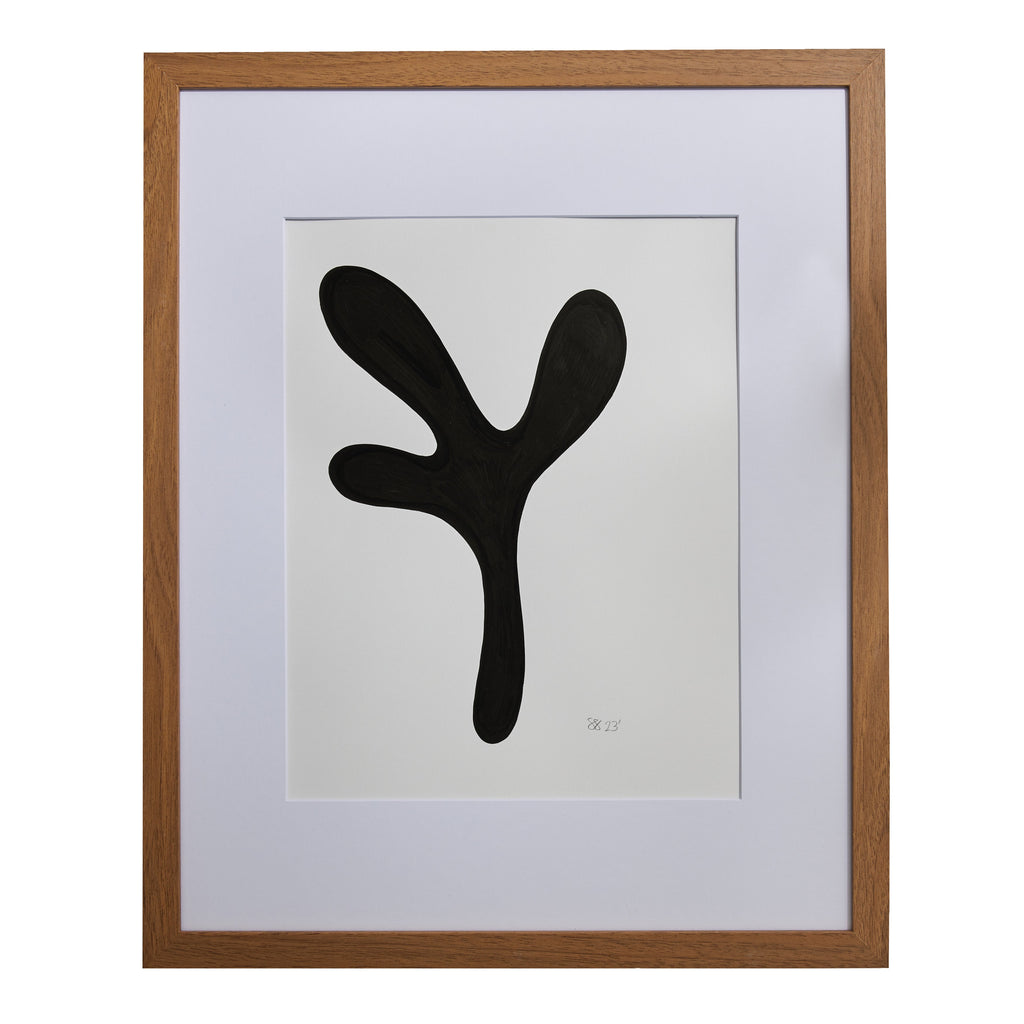 The artwork 'Morning Meditation I' by Shadia Sabagh features a bold, minimalist black organic shape against a white background, resembling a fluid, abstract form with multiple extending curves. The piece, executed in acrylic marker on mixed media paper, is presented in a classic wooden frame with white matting. 20x16 inches. By Shadia Sabagh.