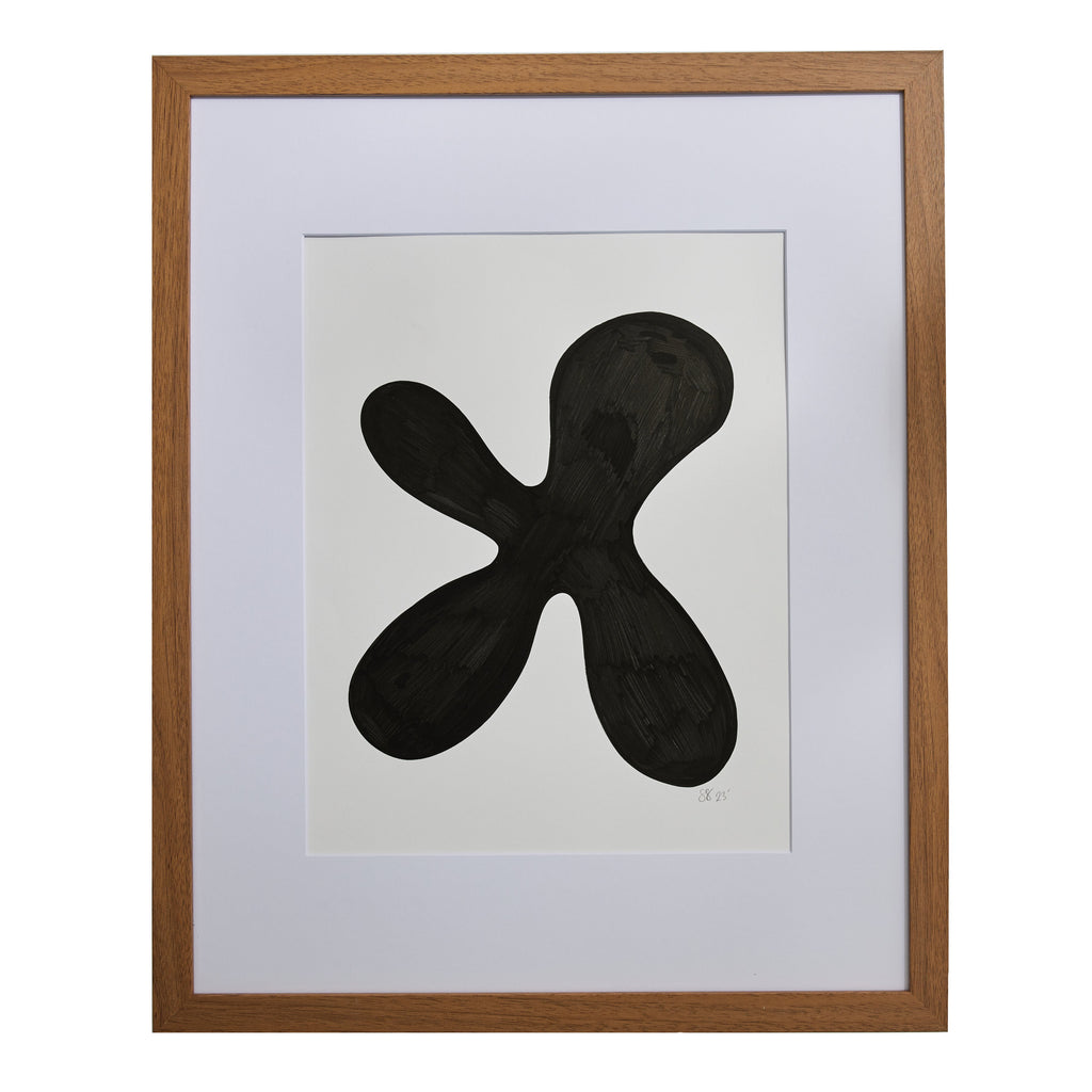 The artwork 'Morning Meditation VIII' by Shadia Sabagh features a bold, abstract black organic shape resembling a four-petaled flower or cross on white mixed media paper. The minimalist design is executed in acrylic marker with clean, flowing lines, professionally presented in a wooden frame with white matting.