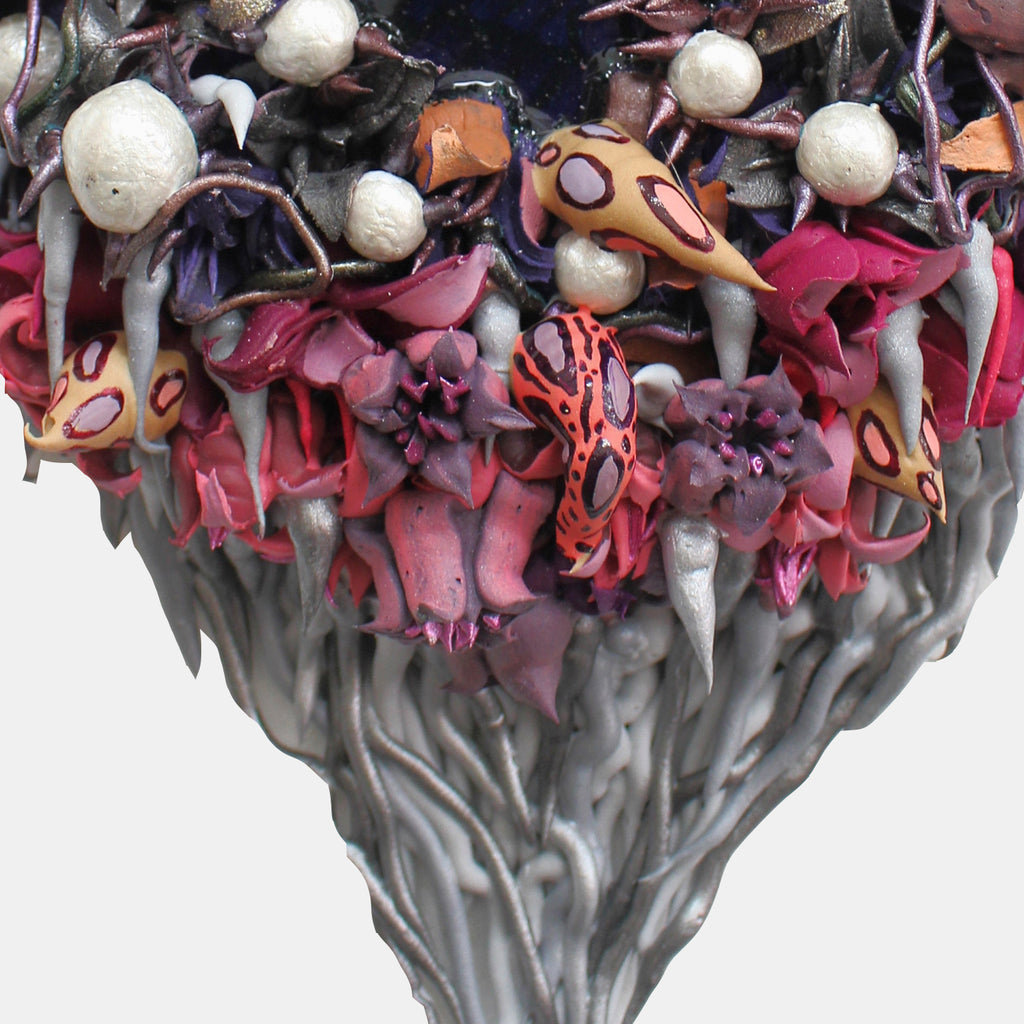 The artwork 'Mirroire' by Seren Morey features intricate sculptural details with pearl-like white spheres nestled among coral-inspired forms in deep magenta and silver. Abstract organic shapes in orange and pink emerge from a textured gray base, creating a dynamic three-dimensional composition using ultralight acrylic and mixed media on panel.