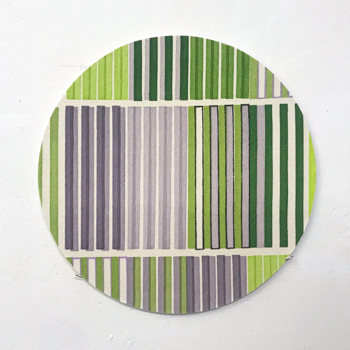 The artwork 'Line Study 2' by Molly Koehn features vertical stripes in a circular composition, alternating between green and gray tones. The geometric pattern creates a modern, minimalist design on raw silk mounted to birch, with varying stripe widths and gradient effects from light to dark shades. 10x10 inches contemporary abstract art.