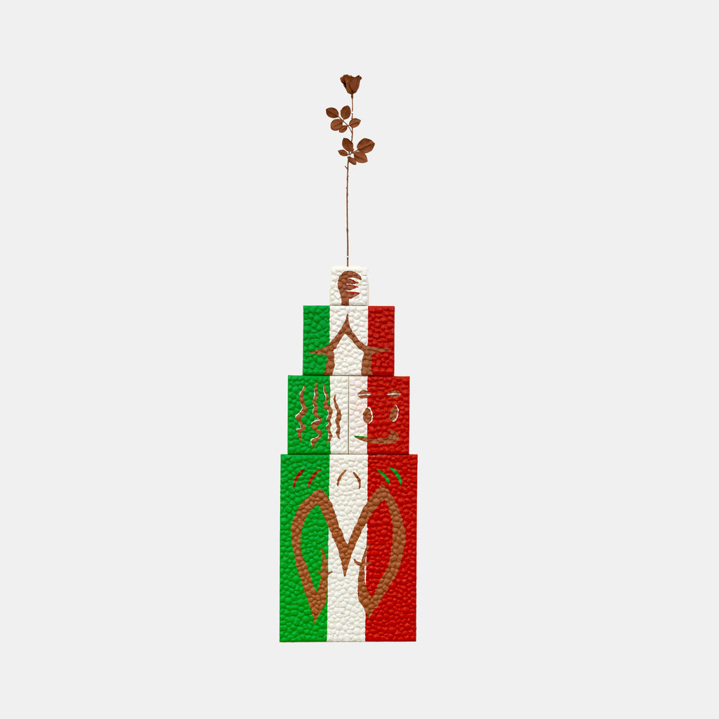 Neither Here Nor There C by Marco DaSilva features a striking vertical composition with red and green geometric blocks creating a stepped tower pattern. A delicate brown floral stem emerges from a copper-toned sphere at the top. The textured canvas surface is embellished with rhinestones and glossy polyurethane, creating a modern mixed-media aesthetic.