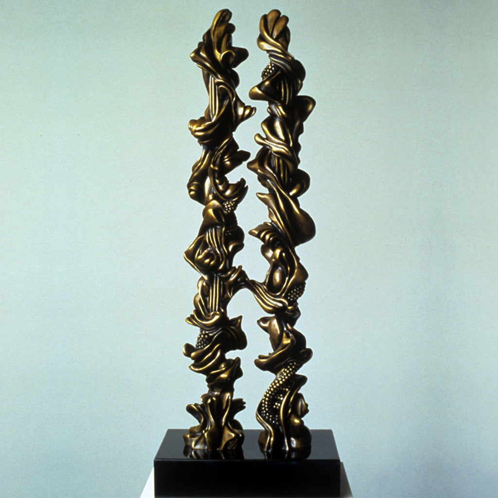 The sculpture 'NEXUS' by Nora Chavooshian features two parallel ascending bronze columns with dynamic twisted ribbons and undulating forms, creating a harmonious vertical movement. The textured bronze surface captures light and shadow, mounted on a sleek black marble base. The abstract design suggests organic growth and symmetrical balance, standing 36 inches tall.