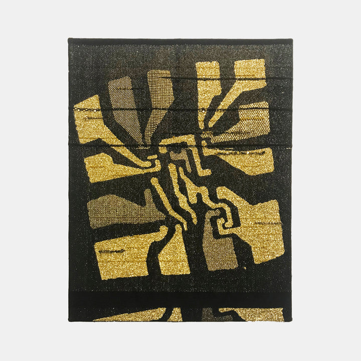 The artwork 'Noise Gate' by Robin Kang features an abstract geometric pattern in metallic gold and tan hues against a deep charcoal background. Hand-woven using Jacquard technique, the composition displays radiating angular shapes creating a dynamic spiral effect, reminiscent of electronic circuit patterns. The contrasting textures of cotton and metallic yarn create a sophisticated interplay of light and shadow.