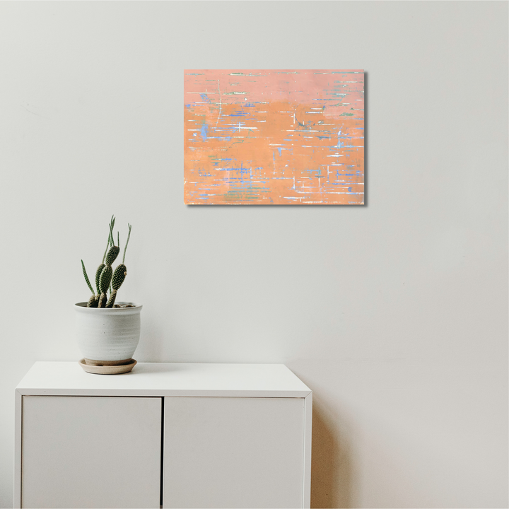 The artwork 'Overture' by Shira Toren features a textured abstract composition in soft peach and powder blue tones. Horizontal brushstrokes and scattered geometric patterns create a sense of movement across the Venetian plaster surface. The minimalist design evokes a gentle, atmospheric quality with layered pigments on canvas. 18x24 inches abstract painting by Shira Toren.