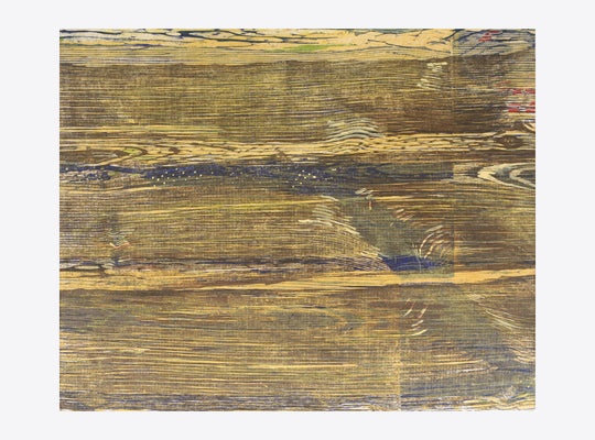 The artwork 'Floating Core' by Emna Zghal features abstract horizontal layers of woodcut prints in earthy gold and deep charcoal tones. The textured composition reveals natural wood grain patterns and organic striations, creating a contemplative landscape-like effect mounted on canvas. The 16x20 inch piece demonstrates masterful woodblock printing technique with subtle color variations and rustic textures.
