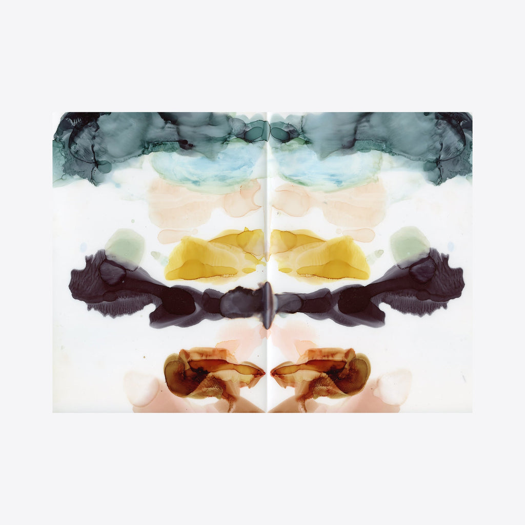 The artwork 'Majestic Vortex' by Lauren Packard features a symmetrical abstract composition in alcohol ink on yupo paper. Fluid bands of teal, golden yellow, deep burgundy, and copper create a mirror-like effect, flowing outward from a central vertical axis. The ethereal watercolor-like technique creates a dreamy, atmospheric quality with translucent layers merging seamlessly.