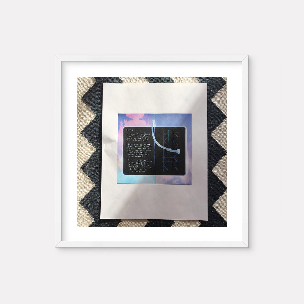 The artwork 'Performance' by Anne Sherwood Pundyk features a square composition with handwritten text on a black surface against an ethereal blue and purple background. The piece is presented in a white frame, mounted on a geometric black and beige chevron pattern. The digital print combines minimalist design with poetic elements, creating a contemplative modern aesthetic. By Anne Sherwood Pundyk