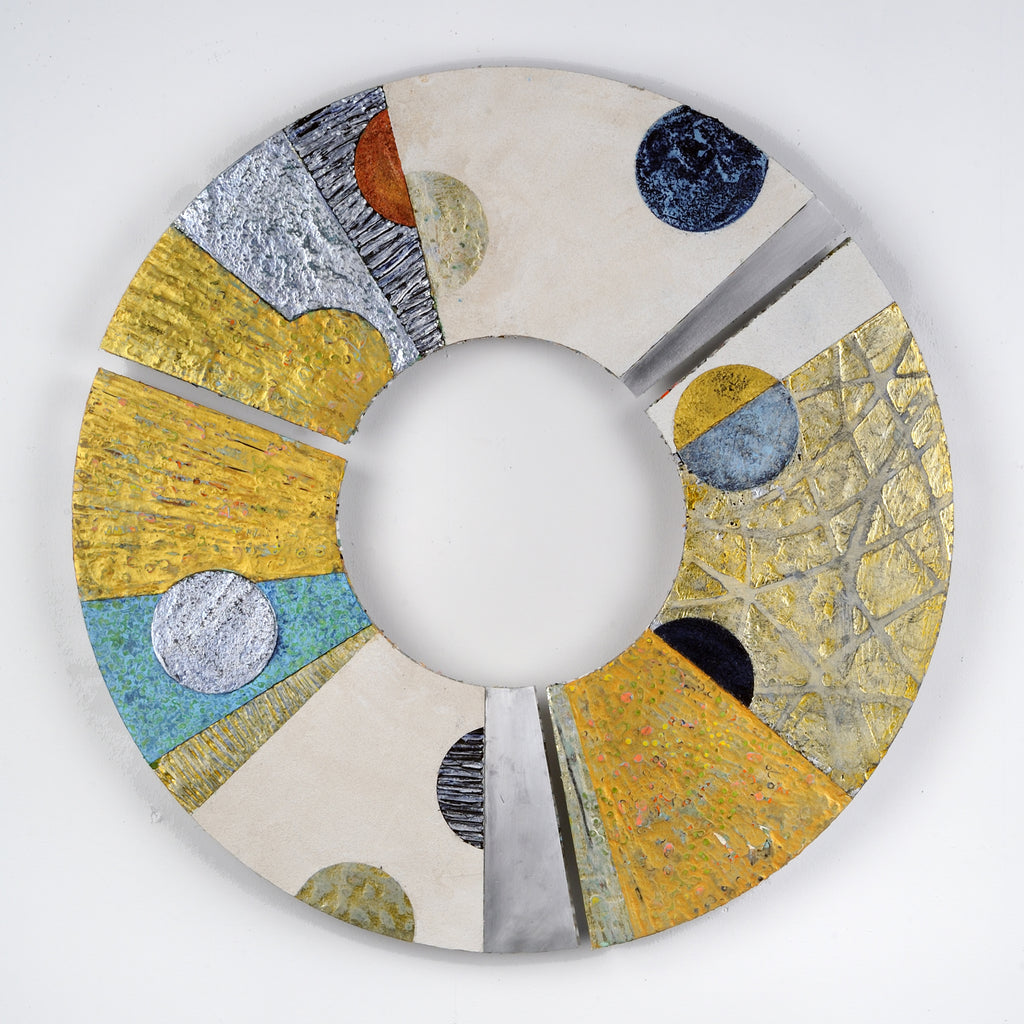 The artwork 'Convex #35' by Francie Hester features a circular composition with abstract geometric elements, combining vibrant gold sections with turquoise accents and metallic silver details. Textured spherical forms in navy blue, black, and neutral tones float across the segmented aluminum surface, created with acrylic and cold wax technique.
