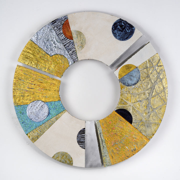 The artwork 'Convex #35' by Francie Hester features a circular composition with abstract geometric elements, combining vibrant gold sections with turquoise accents and metallic silver details. Textured spherical forms in navy blue, black, and neutral tones float across the segmented aluminum surface, created with acrylic and cold wax technique.