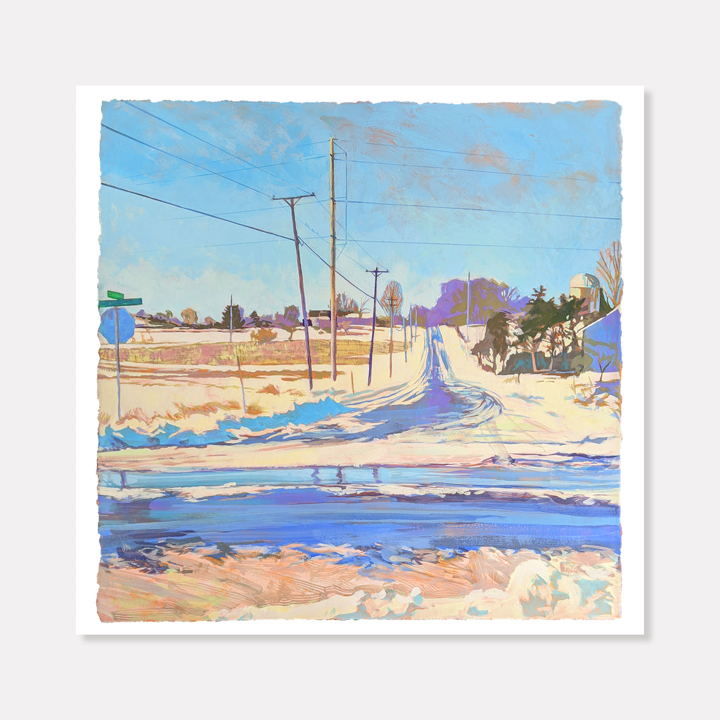 The artwork 'E. Lakeview Hill Rd' by Justin Shull captures a winter rural landscape with utility poles along a snow-covered road. Painted in acrylic gouache, the scene features soft pastels of blue, peach, and white, depicting pristine snow banks against a pale blue sky. Power lines stretch across the composition, creating linear elements through the serene winter scene.
