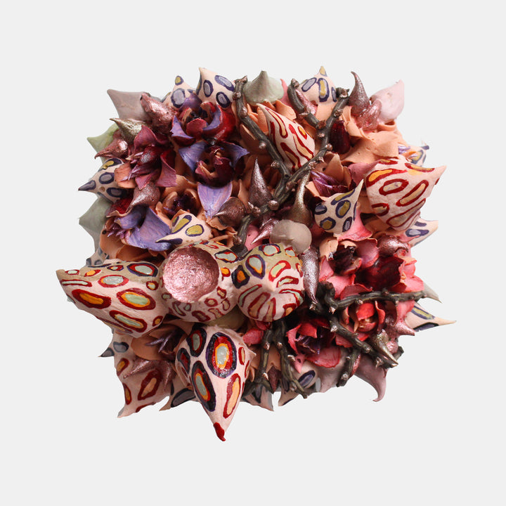 The artwork 'Pandora' by Seren Morey features a vibrant sculptural composition of coral-like forms in pink, red, and purple hues. The ultralight acrylic piece displays intricate organic patterns with circular motifs and spiky protrusions, creating a dynamic three-dimensional effect against a white background. The 6.5-inch square panel showcases textural elements and flowing forms reminiscent of marine life by Seren Morey.