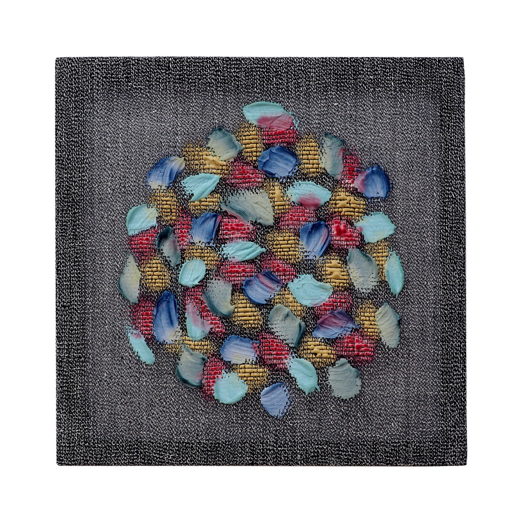 The artwork 'Petals' by Morgan Hale features a circular arrangement of delicate, petal-like forms in blue, mint, and coral hues against a textured gray background. The handwoven linen creates an intricate pattern while dyed plaster elements add dimensional depth, measuring 15x15 inches. The composition suggests a blooming floral pattern with overlapping organic shapes.