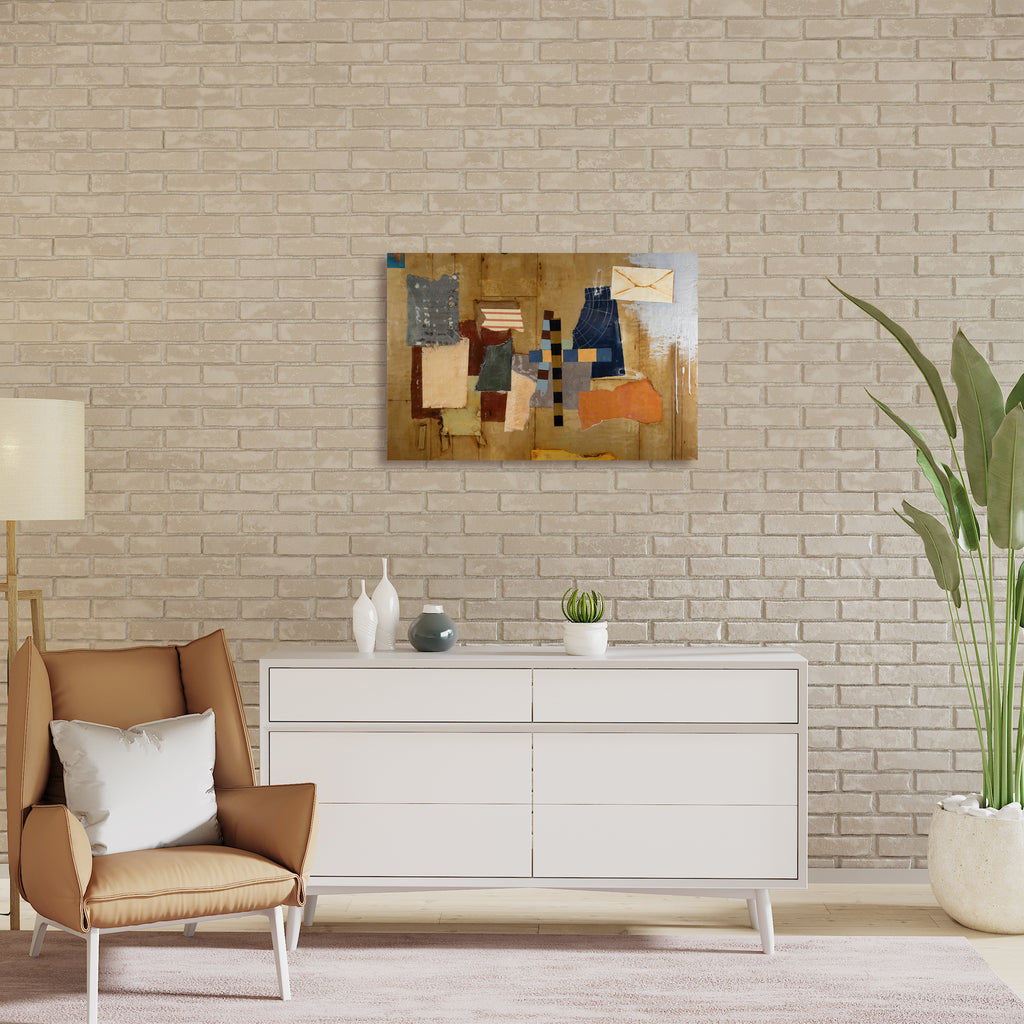 The artwork 'Remainder of Days' by Karen Nielsen-Fried features an abstract collage composition on a warm golden background. Geometric shapes in denim blue, rustic orange, and muted grays create a fragmented landscape. A central cross-like pattern of blue and gold squares intersects torn paper elements and textured surfaces, executed in encaustic and oil on wood panel, measuring 24x36 inches.