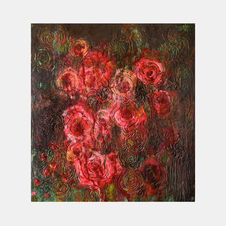 The artwork 'Roses, Ghosts and Galaxies' by Seren Morey features luminous coral-red roses swirling against a dark, mysterious background. Textured encaustic spirals create ethereal patterns, while metallic green accents shimmer throughout the composition. The dimensional surface suggests cosmic movement, blending floral and celestial elements in a 66x60 inch panel.