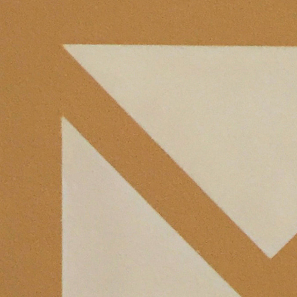 The artwork 'Prejudice' by Shyun Song features a minimalist geometric composition with sharp angular forms in warm ochre and ivory white. A bold diagonal line creates dramatic contrast across the canvas, showcasing clean edges and precise color blocking characteristic of abstract modernism. Oil on canvas, this piece is part of a diptych measuring 20x16 inches.