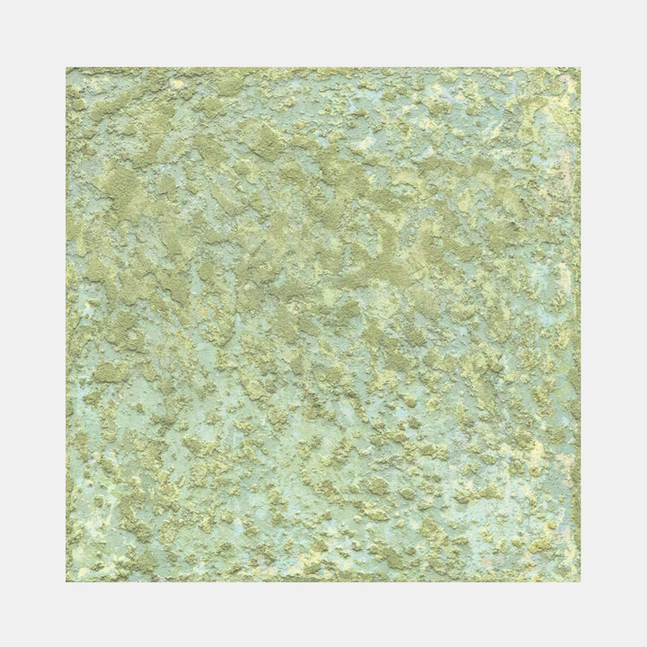 The artwork 'Sediment V' by Jacqueline Ferrante features a textured abstract composition in sage green and mint hues. The surface appears weathered and organic, reminiscent of natural mineral formations, created through layered acrylic and concrete on birch panel. The 10x10 inch piece showcases a mottled, earthy patina with subtle color variations throughout the composition.