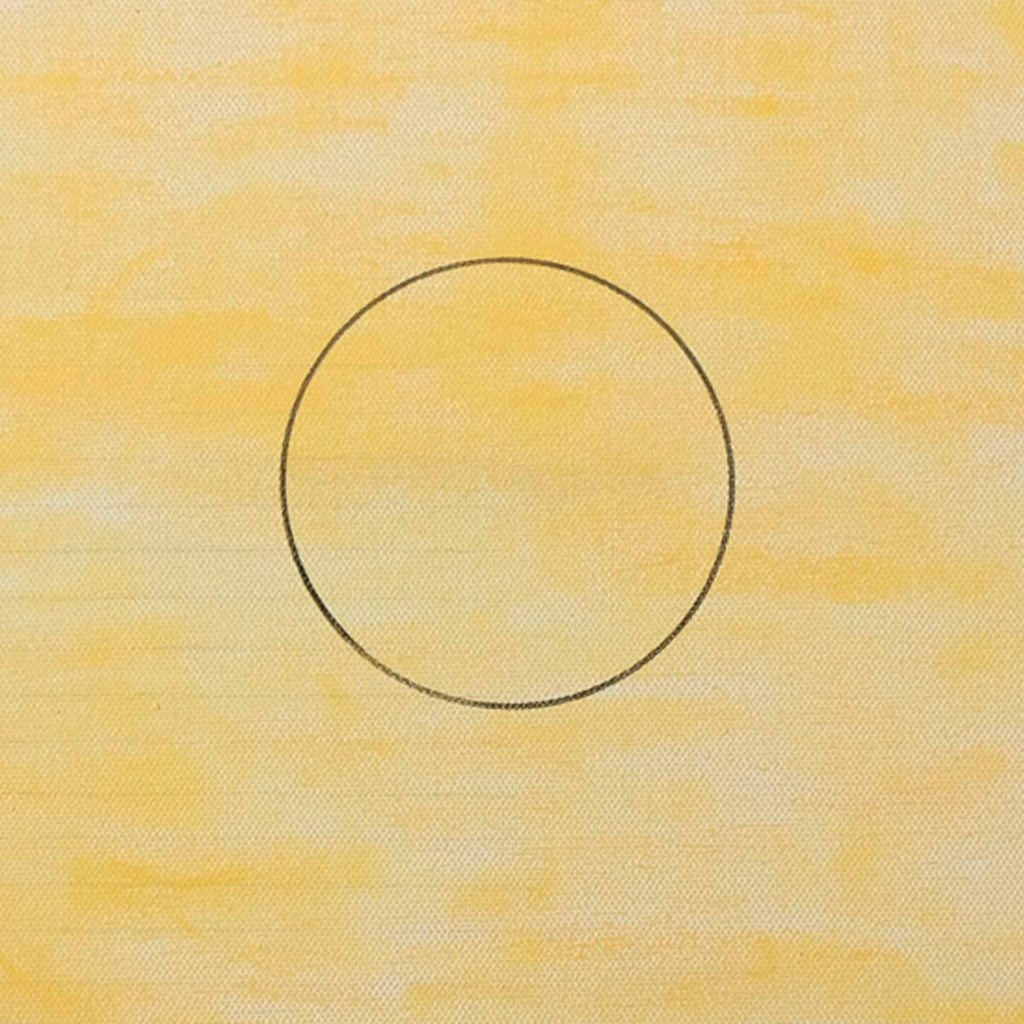 The artwork 'Serenite' by Gauthier Denoyelle features a minimalist composition with a perfect black circle drawn in marker on a warm yellow background. The textured canvas surface shows subtle variations in the yellow hue, created with crayon and pencil, giving depth and serenity to the 18x18 inch contemporary piece by Gauthier Denoyelle.