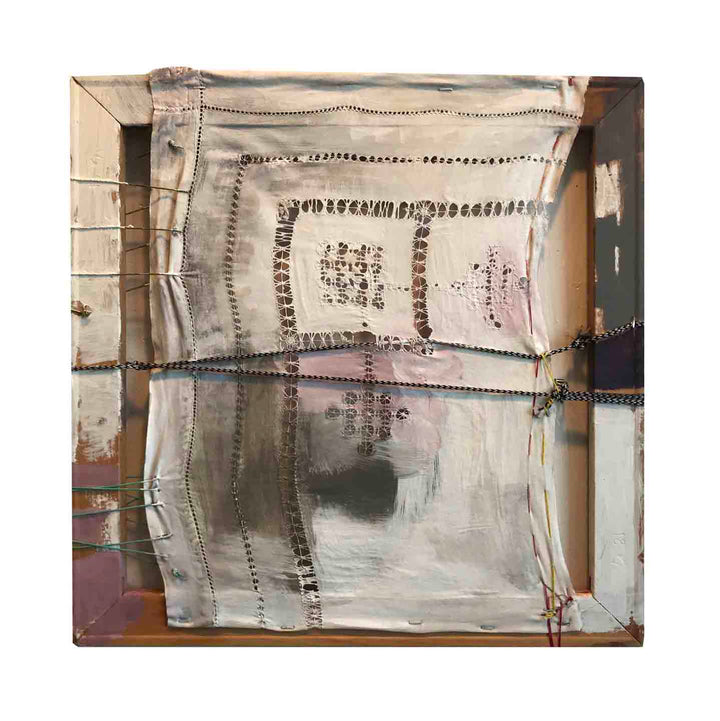 The artwork 'Shadows' by Cecilia Andre features an abstract collage composition with layered fabric elements in muted beige and gray tones. Dotted stitch patterns create geometric shapes against a textured background, combining rough and smooth surfaces. The 18x18 inch piece showcases a distressed, weathered aesthetic with subtle color transitions and architectural elements.