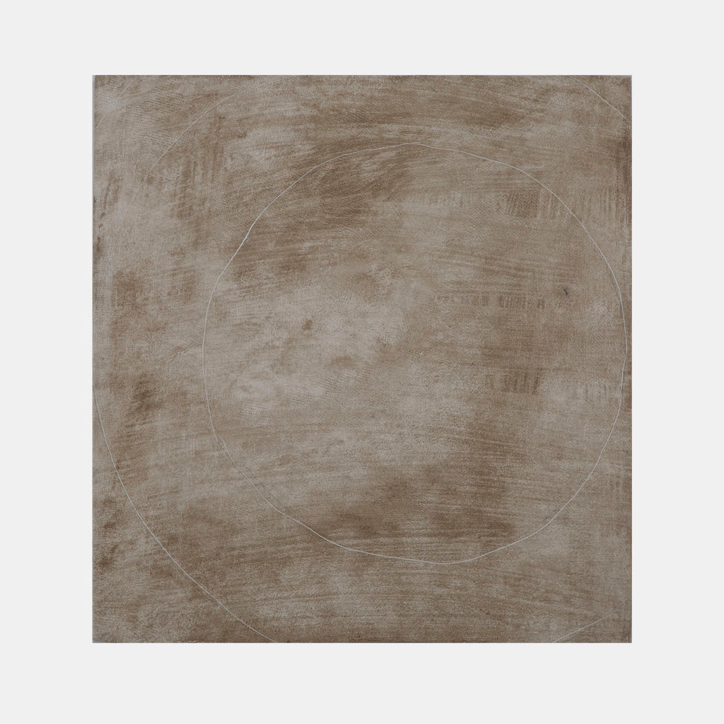 The artwork 'Small Cross' by Troy Medinis features a minimalist composition with a subtle circular form etched into a textured taupe-colored acrylic surface. The panel exhibits a weathered, earthy appearance with brushed textures and varying tonal gradations creating depth and visual interest in the monochromatic palette by Troy Medinis.