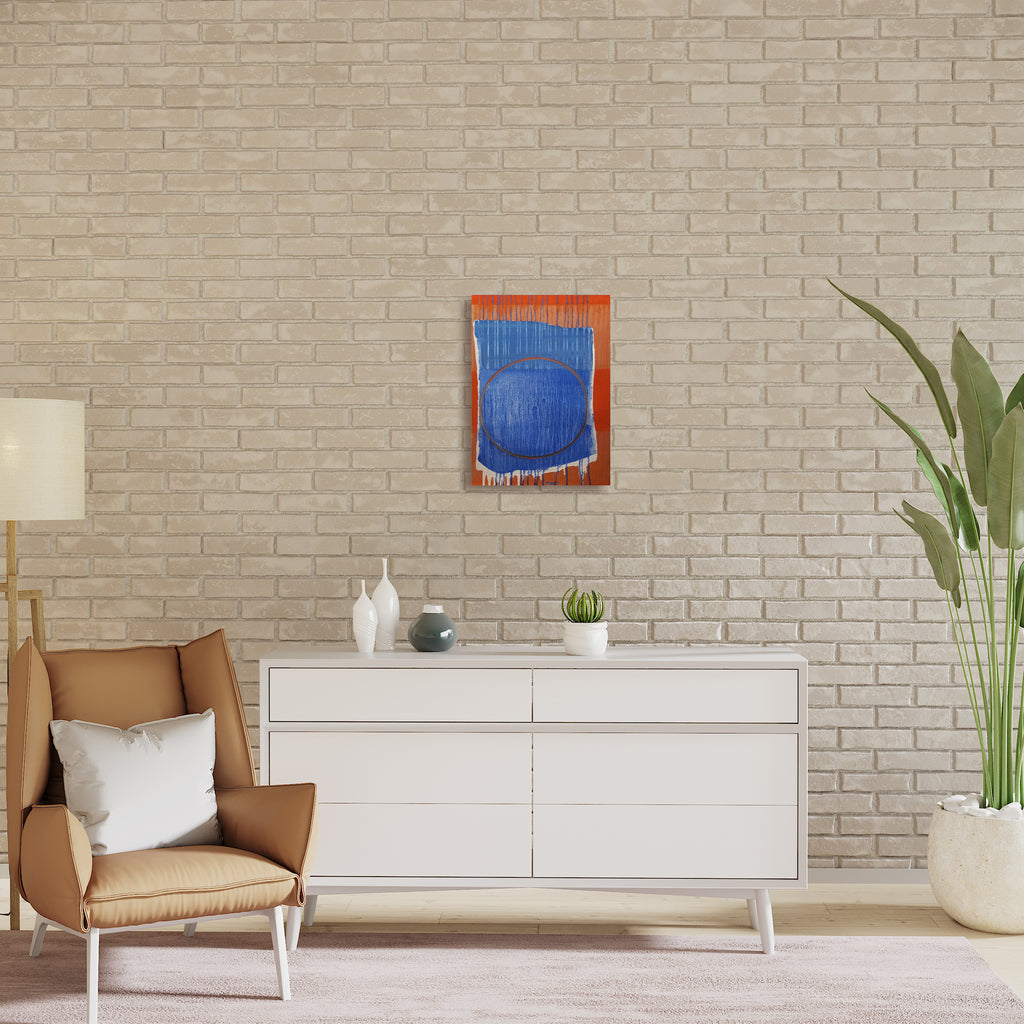 The artwork 'The Journey Of Self Discovery' by Jade Chan features a bold abstract composition with a dominant circular form in deep blue against a vibrant orange background. Vertical dripping lines create texture throughout, while a brown circular outline adds geometric contrast. The oil painting showcases expressive brushwork and a striking complementary color palette.