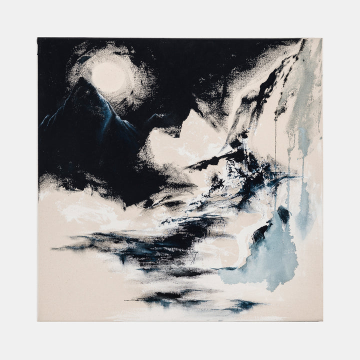 The artwork 'The Grey Lands' by W Lu features a dramatic abstract landscape with sweeping brushstrokes in black, white, and soft blue tones. The composition suggests a mountainous terrain under a luminous moon, with dynamic movement created through expressive acrylic techniques on canvas. The 24x24 inch piece combines ethereal mists and bold contrasts to evoke a moody, atmospheric scene.