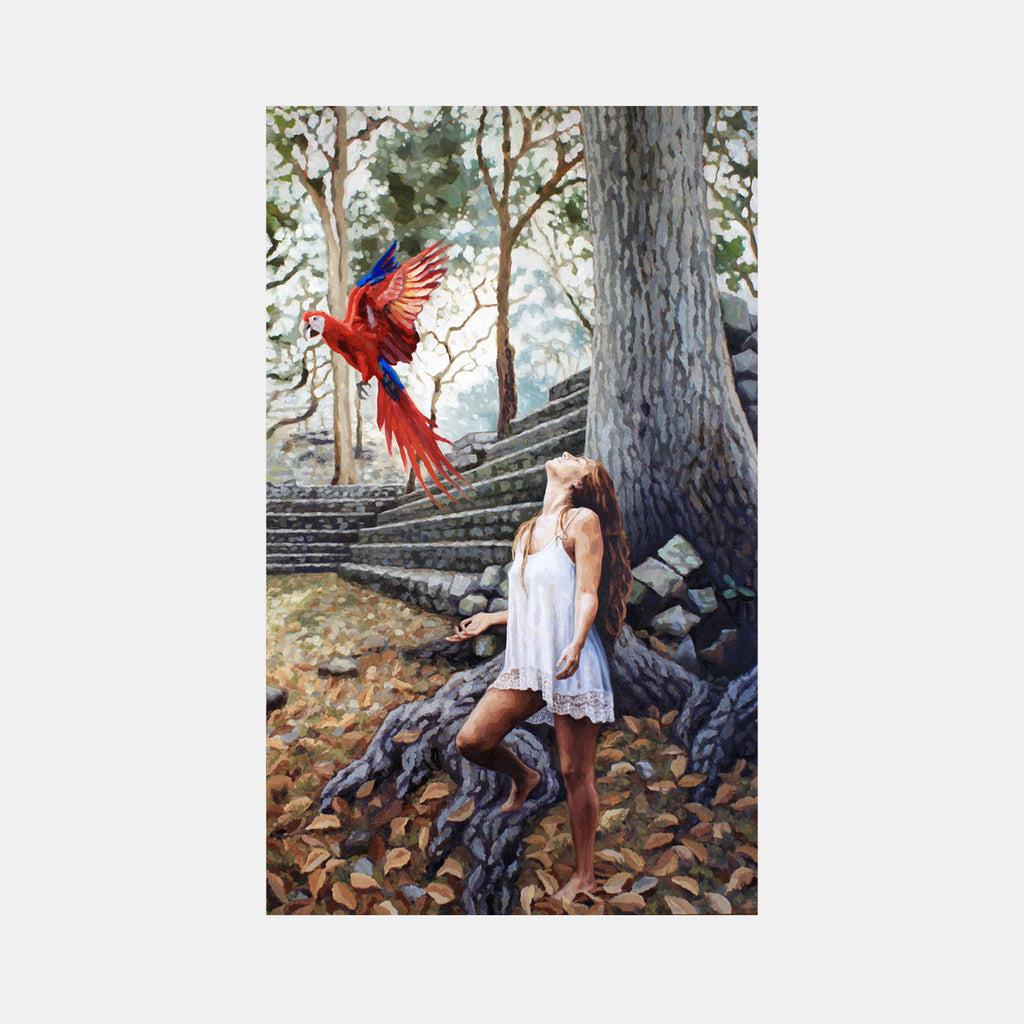 The artwork 'To You From Me' by Elody Gyekis depicts a vibrant red cardinal in mid-flight against a misty forest backdrop with stone steps. A white-dressed figure leans against a large tree trunk amid fallen autumn leaves. The oil painting features ethereal natural lighting and soft brushwork, creating a dreamy woodland atmosphere on a 60x36 inch canvas. By Elody Gyekis.