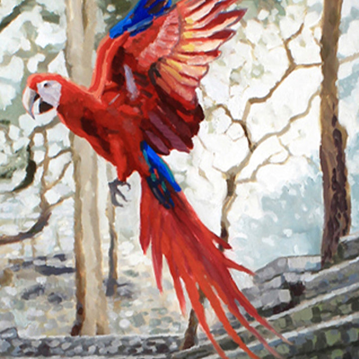 The artwork 'To You From Me' by Elody Gyekis features a vibrant scarlet macaw in mid-flight, displaying its magnificent red and blue plumage against a misty forest backdrop. The oil painting captures the bird's dynamic movement with outstretched wings, detailed feather work, and rich crimson tones contrasting with the soft, ethereal woodland setting.