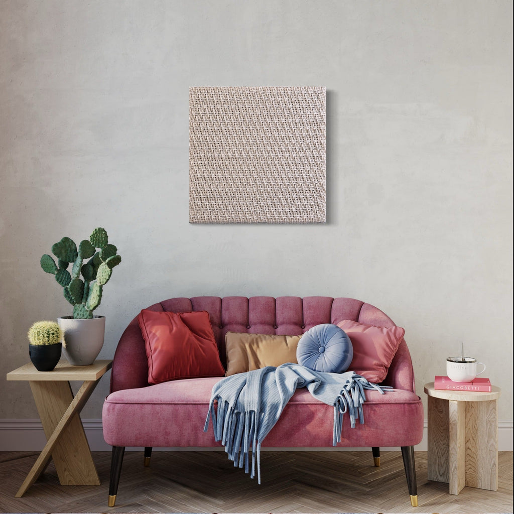 The artwork 'Magnify III' by Morgan Hale features an intricate handwoven cotton textile in neutral beige tones, displaying a detailed diamond pattern across a 24x24 inch canvas. The textural weave creates a subtle dimensional effect, showcasing contemporary minimalist design through traditional craftsmanship. Artwork shown in modern living space setting.