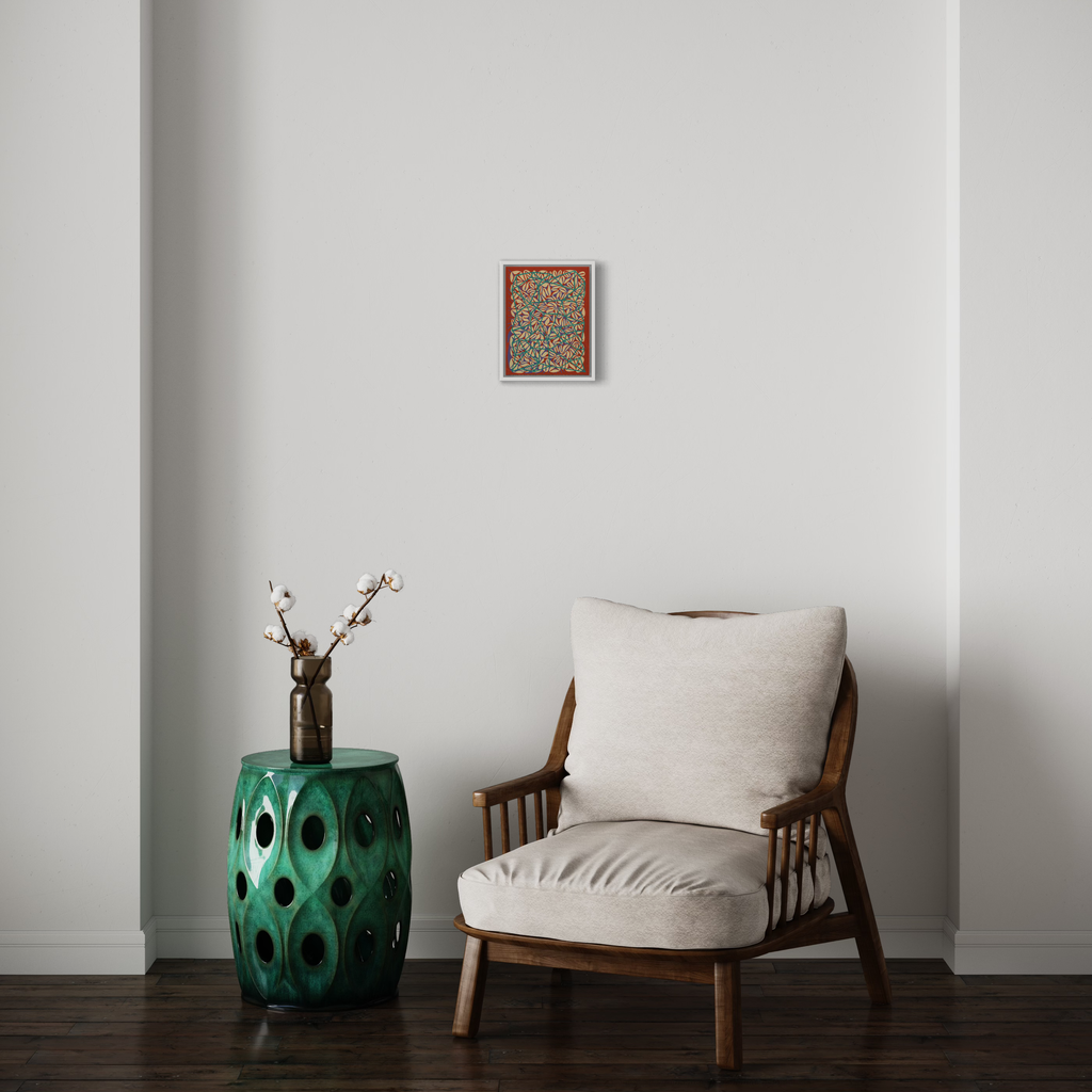 Print 12 by Patricia Fabricant, displayed in a minimalist room setting featuring a framed abstract silkscreen artwork with intricate patterns and warm tones, mounted above a mid-century modern wooden armchair with beige cushions, complemented by a green ceramic garden stool holding cotton stems in a vase. Artwork dimensions 11x8.5 inches.