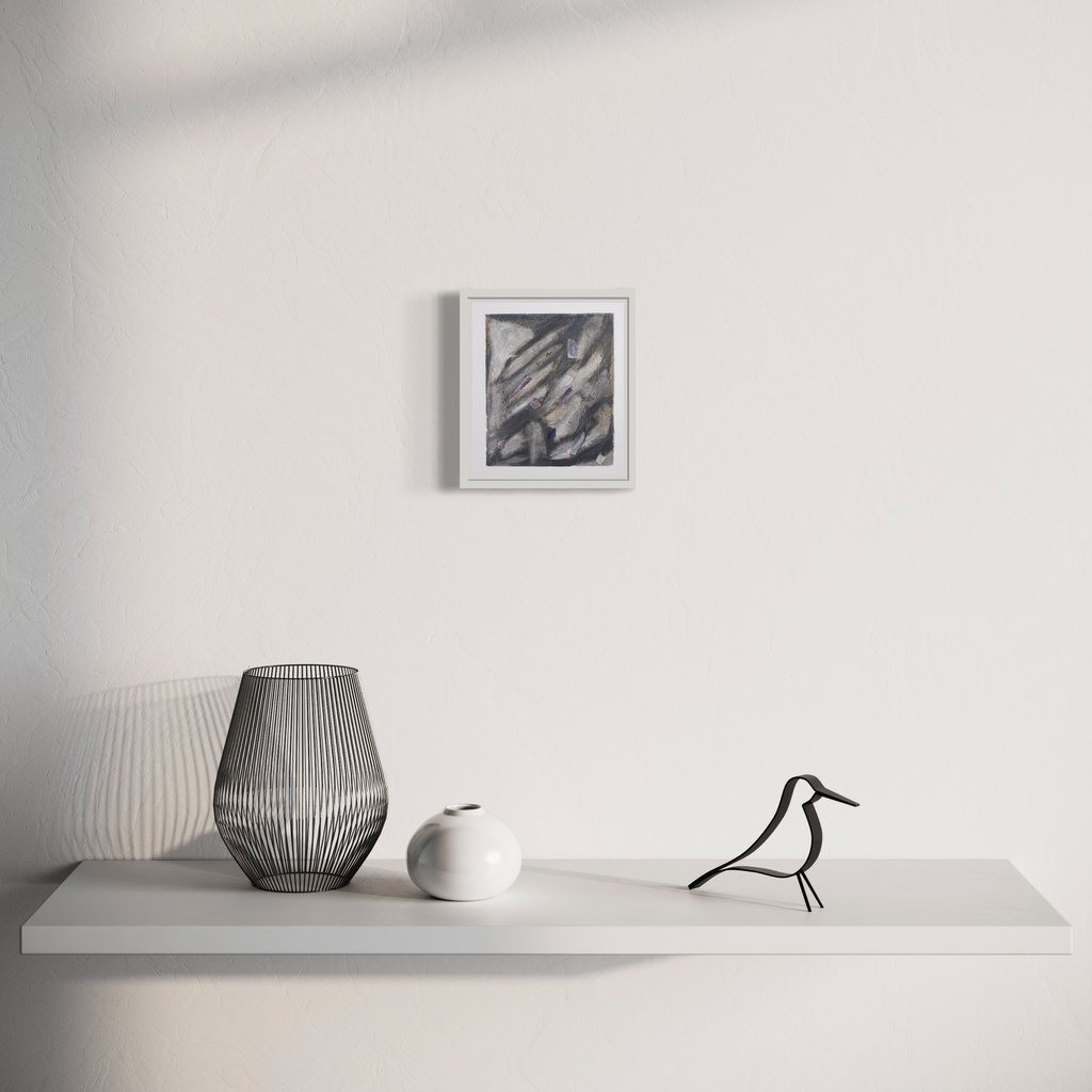 The artwork 'Cagliari (3)' by Diana Naccarato features an abstract pencil drawing with dynamic diagonal strokes in grayscale, displayed in a white frame alongside a modern vignette showing a minimalist shelf with decorative objects including a wire bird sculpture, geometric vases in white and gray tones.